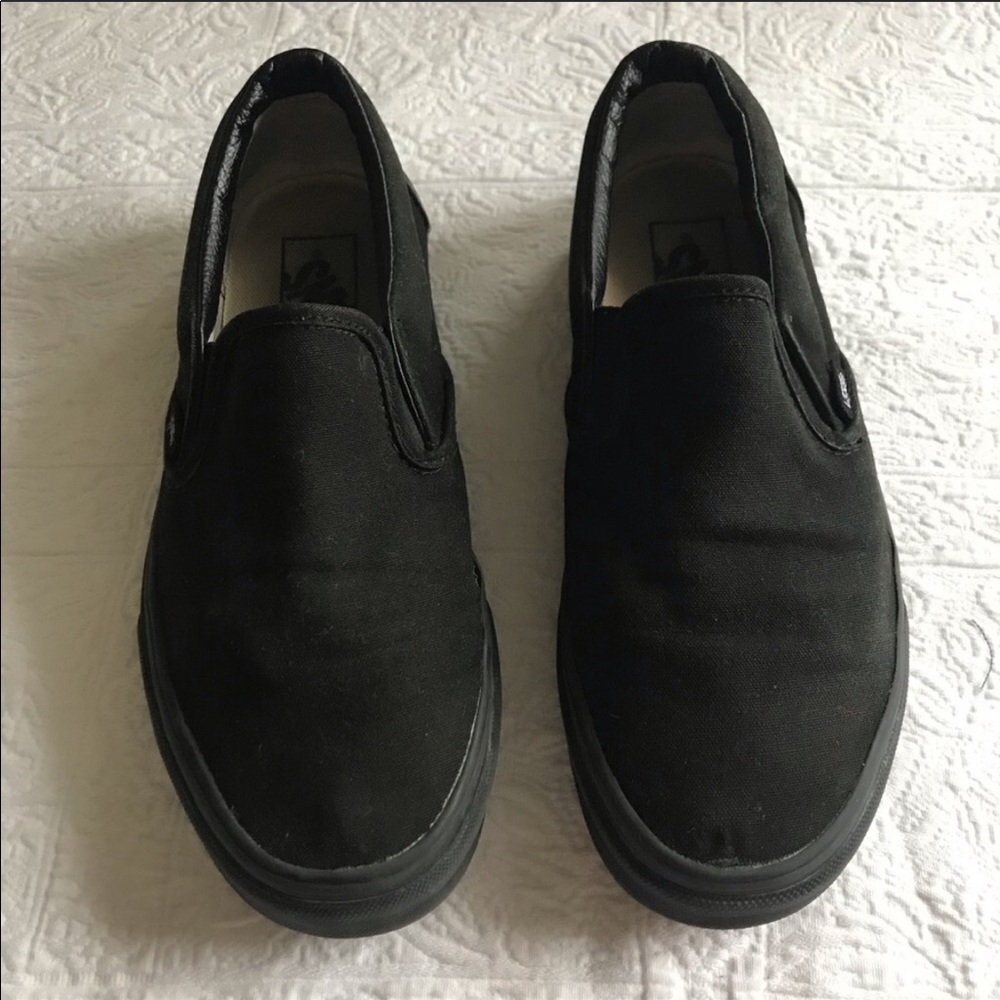 vans black slip ons!
